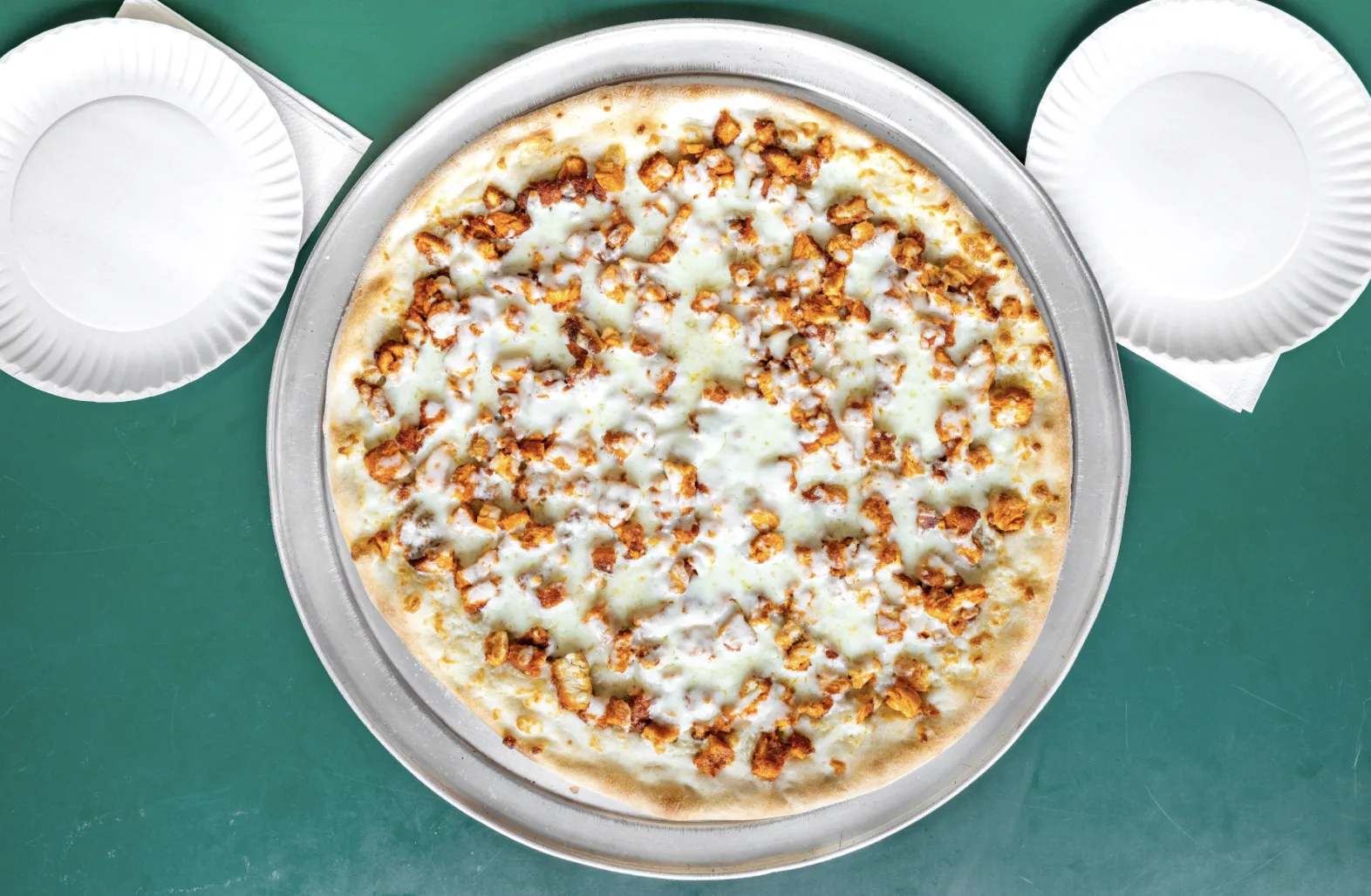 Chicken specialty pizza fresh from the oven